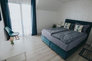 Postel nebo postele na pokoji v ubytování WPO - WILD PIKE OASIS