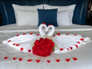 Кровать или кровати в номере Rosa Cruise