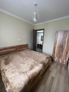 Una cama o camas en una habitación de APARTAMENT WITH SEA VIEW 10 fotos más