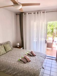 En eller flere senger på et rom på Casa Monet - La Calma - 4 pools- Big terrace - Orihuela Costa