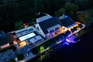 an aerial view of a house with a swimming pool at WPO - WILD PIKE OASIS in Caraorman