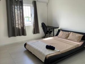 Kama o mga kama sa kuwarto sa Cozy Place