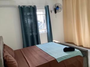 Kama o mga kama sa kuwarto sa Cozy Place