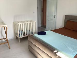 Kama o mga kama sa kuwarto sa Cozy Place