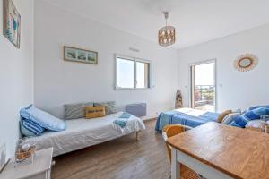 Ένα ή περισσότερα κρεβάτια σε δωμάτιο στο Maison avec piscine spa - Ti Laouen +16 φωτογραφίες