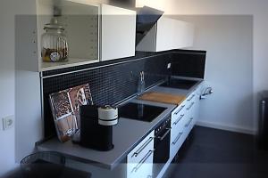 a kitchen with a sink and a counter top at Relaxhome in Lindlar