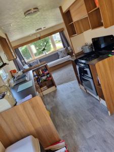 an aerial view of a kitchen in an rv at Skipsea sands holidays in Ulrome