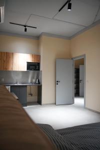Kuchyň nebo kuchyňský kout v ubytování Boomerang apart-apart hotel