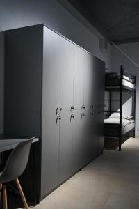 Postel nebo postele na pokoji v ubytování Boomerang apart-apart hotel