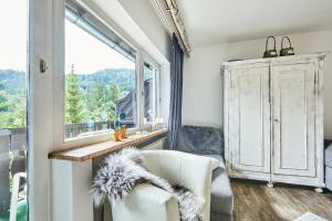 Posezení v ubytování Ferienwohnung Loferblick