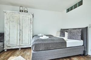 Postel nebo postele na pokoji v ubytování Ferienwohnung Loferblick