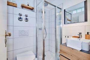 Koupelna v ubytování Ferienwohnung Loferblick + 11 fotografií