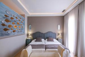 Postel nebo postele na pokoji v ubytování Hotel restaurant Ceferino