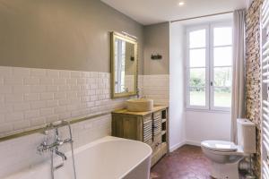 Koupelna v ubytování Maison d'hôtes le Prieuré du Preux