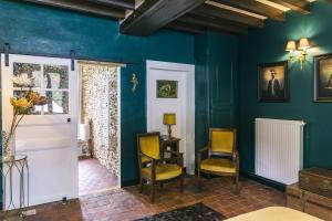 Posezení v ubytování Maison d'hôtes le Prieuré du Preux
