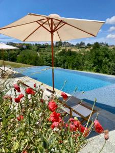 Bassenget på eller i nærheten av Cascina Gazzeri Country House