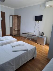 Postel nebo postele na pokoji v ubytování Hotel Zundaga
