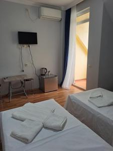 Postel nebo postele na pokoji v ubytování Hotel Zundaga