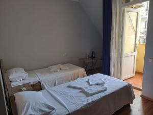 Postel nebo postele na pokoji v ubytování Hotel Zundaga
