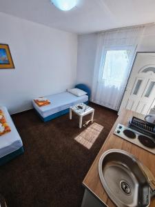 Postel nebo postele na pokoji v ubytování Guest house Davorka
