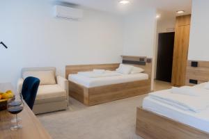 Posteľ alebo postele v izbe v ubytovaní Apartments & rooms Stella Adriatica