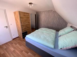 Postel nebo postele na pokoji v ubytování Haus Rosa