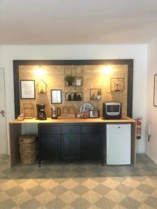a kitchen with a counter with a microwave on it at Haus Anna in Rauma