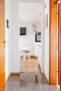 a kitchen with a table and a dining room at Green Point in Preserje