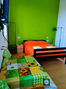 A bed or beds in a room at MonoPat