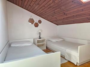 Postel nebo postele na pokoji v ubytování Apartment Školj