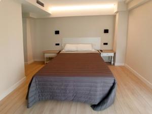 Postel nebo postele na pokoji v ubytování Bahia Rooms Cantabria 3000