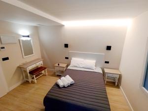 Postel nebo postele na pokoji v ubytování Bahia Rooms Cantabria 3000