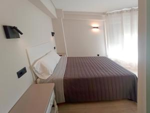 Postel nebo postele na pokoji v ubytování Bahia Rooms Cantabria 3000
