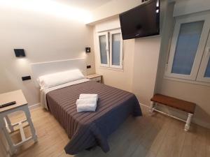 Postel nebo postele na pokoji v ubytování Bahia Rooms Cantabria 3000