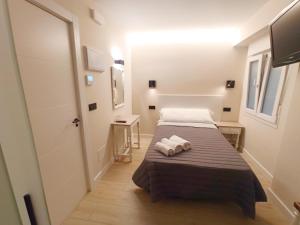 Postel nebo postele na pokoji v ubytování Bahia Rooms Cantabria 3000