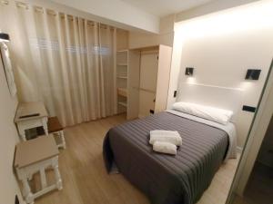 Postel nebo postele na pokoji v ubytování Bahia Rooms Cantabria 3000