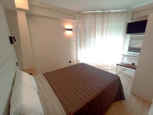 Postel nebo postele na pokoji v ubytování Bahia Rooms Cantabria 3000