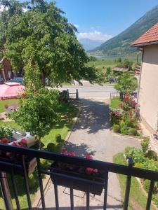 a balcony with a view of a parking lot at Rooms Lida & Friendly home in Plav