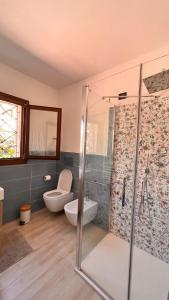Koupelna v ubytování Zenia Rooms