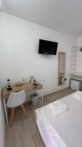 Postel nebo postele na pokoji v ubytování Zenia Rooms