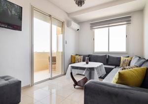Posezení v ubytování Splendide Appartement avec Piscine à Agadir