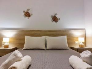 Una cama o camas en una habitación de Blue Horizon Kissamos Apartment