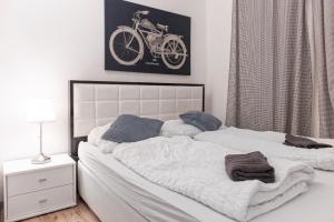 Łóżko lub łóżka w pokoju w obiekcie Affordable 2BR Apt- Connected to the whole city