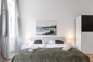 Łóżko lub łóżka w pokoju w obiekcie Affordable 2BR Apt- Connected to the whole city