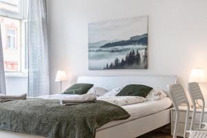 Łóżko lub łóżka w pokoju w obiekcie Affordable 2BR Apt- Connected to the whole city