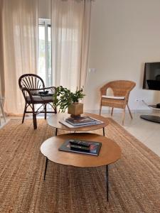 a living room with a coffee table and a couch at Apartment Quinta das Salinas -Great Views in Almancil