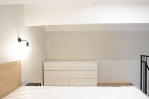 Cama ou camas em um quarto em Sniego Apartments