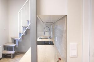 A cozinha ou cozinha compacta de Sniego Apartments
