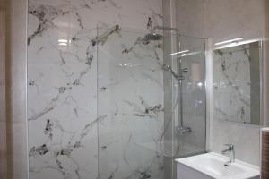a bathroom with a shower and a sink at Villa Aequum in Trogir +123 photos