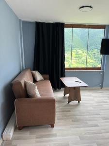 Posezení v ubytování Yamaç Çam Hotel